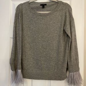 Gray, JCrew sweater with feather trim sleeves, gently worn
